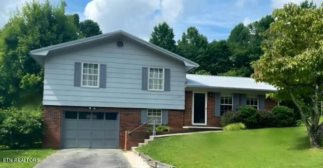 394 NORRIS DR, TAZEWELL, TN 37879, photo 1 of 13